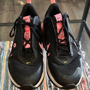 Nike Women's Black Sneakers with Pink Accents